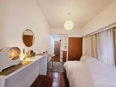 a hotel room with a bed and a bathroom at AsahiStay -Shinjuku, Self check in, Well located house in Tokyo