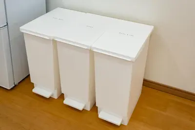 a white table in a room with a refrigerator at Komei Hotel/5min to station/Direct access to Narita and Haneda/Asakusa/Sky tree in Tokyo