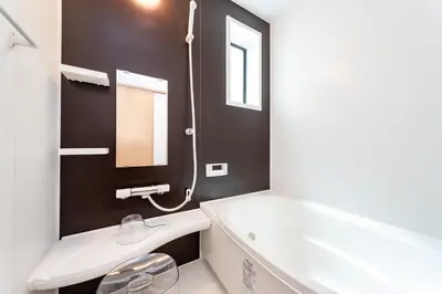 a bathroom with a white tub and a sink at Komei Hotel/5min to station/Direct access to Narita and Haneda/Asakusa/Sky tree in Tokyo