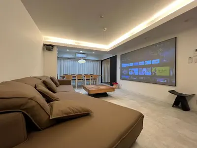 a bedroom with a large bed and a flat screen tv at LoveTokyo Maisonette Terrace in Tokyo