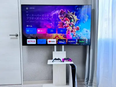 a flat screen tv sitting on top of a wall at JW-One in Tokyo