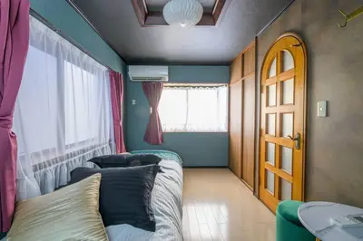 a living room with two couches and a window at Premier suite Nishiazabu Roppongi front in Tokyo