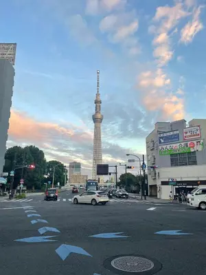 a city intersection with the eiffel tower in the background at CAlMU ASAKUSA IMADO HOTEL ASAKUSA UENO IMADOZINZYA TOKYOSKYTREE HANEDA NARITA GINZA TOKYOSTATION Direct \u6d45\u8349\u4e0a\u91ce\u6771\u4eac\u30b9\u30ab\u30a4\u30c4\u30ea\u30fc \u6210\u7530\u7a7a\u6e2f\u7fbd\u7530\u7a7a\u6e2f\u6771\u4eac\u99c5\u76f4\u884c\u30d0\u30b9 \u96fb\u8eca\u4fbf\u5229 in Tokyo