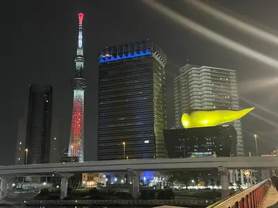 a view of a city at night with the shanghai tower at CAlMU ASAKUSA IMADO HOTEL ASAKUSA UENO IMADOZINZYA TOKYOSKYTREE HANEDA NARITA GINZA TOKYOSTATION Direct \u6d45\u8349\u4e0a\u91ce\u6771\u4eac\u30b9\u30ab\u30a4\u30c4\u30ea\u30fc \u6210\u7530\u7a7a\u6e2f\u7fbd\u7530\u7a7a\u6e2f\u6771\u4eac\u99c5\u76f4\u884c\u30d0\u30b9 \u96fb\u8eca\u4fbf\u5229 in Tokyo