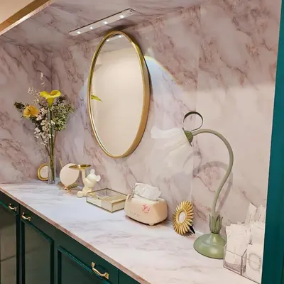 a bathroom with a marble counter with a mirror at ueno minowa 502 in Tokyo