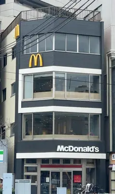 a mcdonalds building with a mcdonalds sign on it at ueno minowa 502 in Tokyo