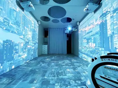 a room with a view of a room with blue walls at Holy Planet in Tokyo