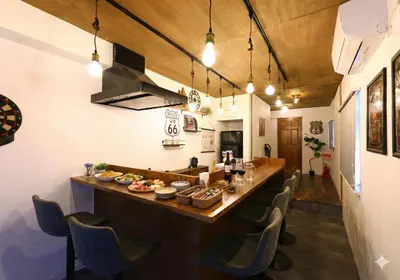 a large wooden bar in a room with chairs at \u548c\u6c23\u4f1a\u3005\u90fd\u7acb\u5bb6\u653f Wakiaiai Toritsukasei in Tokyo