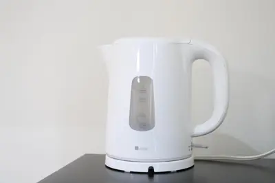 a white electric blender sitting on a table at Bliss IKEBUKURO in Tokyo