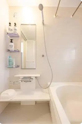 a bathroom with a tub and a sink and a toilet at JRTakadababa 2min 5LDK 5beds 2unit room in Tokyo