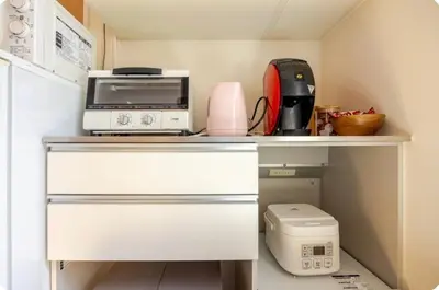 a kitchen with a counter with a microwave and a toaster at JRTakadababa 2min 5LDK 5beds 2unit room in Tokyo