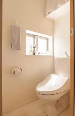 a bathroom with a white toilet and a window at JRTakadababa 2min 5LDK 5beds 2unit room in Tokyo