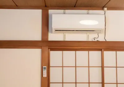 a room with a window with a air conditioner at Lido Urayasu in Tokyo