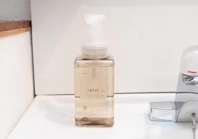 a bottle of soap sitting on top of a sink at Lido Urayasu in Tokyo