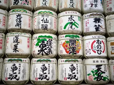 a stack of japanese rice bags with writing on them at illi Mani Shibuya in Tokyo