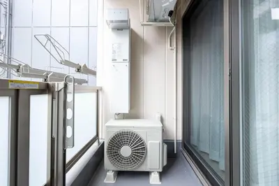 a hospital room with a fan in a room at Mat Hikifune in Tokyo