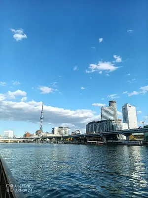 a view of the city from a boat in the water at A16 HOSTEL TOKYO in Tokyo