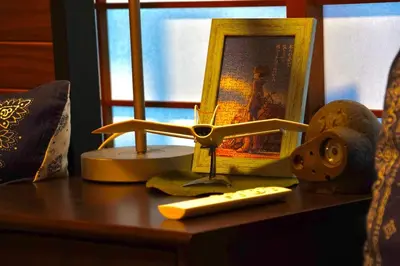 a table with a toy airplane and a remote control at [空港直接アクセス] JR山手線日暮里駅徒歩8分アパートメント/千駄木ハウス in Tokyo