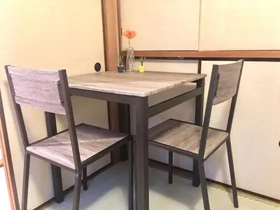 a table and two chairs sitting next to a table at 10 minutes direct to Shibuya Crossing! Heart of Tokyo! Kamiuma in Tokyo
