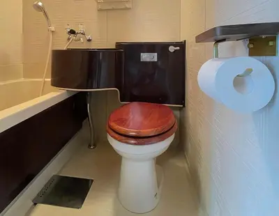 a bathroom with a toilet with a wooden seat at \u62b9\u8336\u5eb5\u4e16\u7530\u8c37\u6771\u4eac Matcha-An Setagaya Tokyo in Tokyo