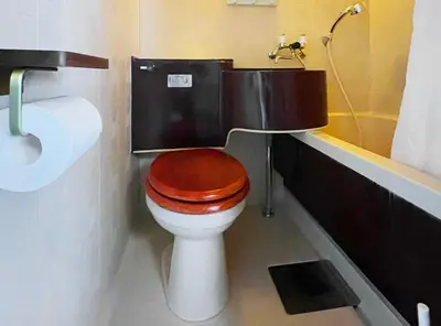 a bathroom with a toilet with a wooden seat at \u62b9\u8336\u5eb5\u4e16\u7530\u8c37\u6771\u4eac Matcha-An Setagaya Tokyo in Tokyo