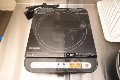 a laptop computer sitting on top of a table at Yutaka bldg.302 in Tokyo