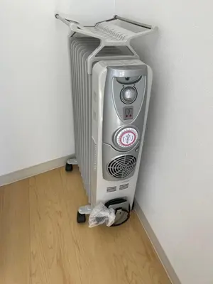 a cpu is sitting in the corner of a room at Aurora 5 in Tokyo