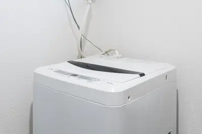 a white box with a sign on top of it at \u5343\u99c4\u6728\u6238\u5efa in Tokyo