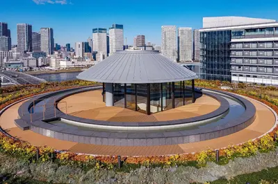 a gazebo in the middle of a city at Tokyo Toyosu Manyo Club in Tokyo