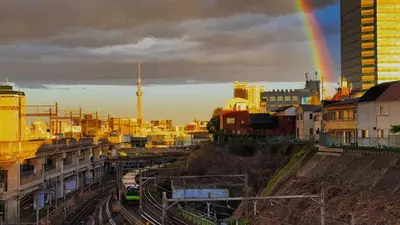 a rainbow over a city with a city with buildings at \u6795\u6728 New house with Huge View for Family-Group in Tokyo