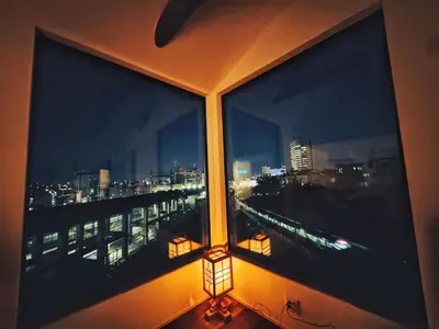 a window with a view of a city at night at \u6795\u6728 New house with Huge View for Family-Group in Tokyo