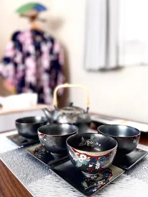 a group of bowls on a tray on a table at \u5409\u5409\u306e\u5bb6 in Tokyo