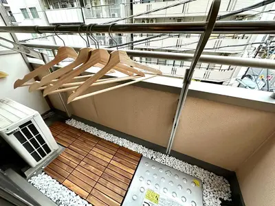 a wooden bench on top of a building at Skyterrace Love Asakusa Downtown in Tokyo