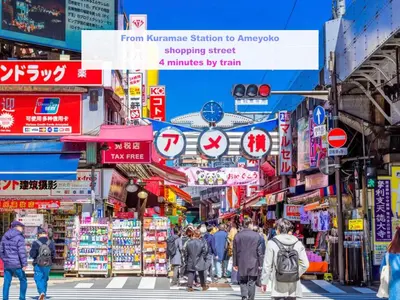 a busy street in an asian city with people crossing the street at Skyterrace Love Asakusa Downtown in Tokyo