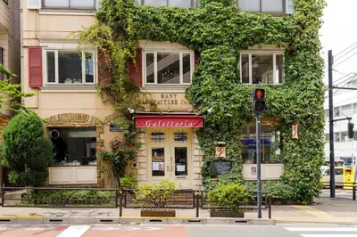 a building with ivy on the side of it at Hotel Re:ONcE Shibuya in Tokyo