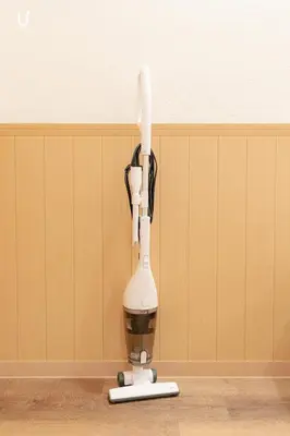 a hair dryer is plugged into a wall at unito residence HIKAWADAI in Tokyo