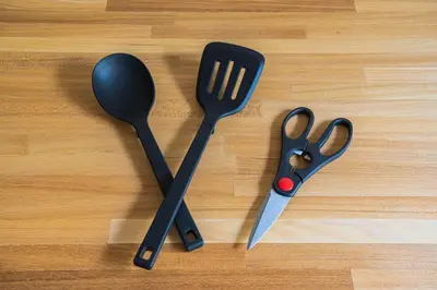 three utensils sitting on top of a wooden floor at unito residence IKEBUKURO in Tokyo