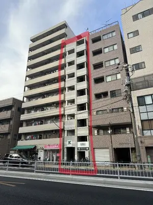 a tall building with a red stripe on the side of it at All room Skytree view hotel-Near Ryukoku,Asakusa,kinshicho in Tokyo