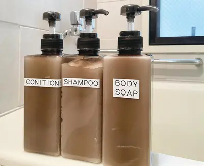 two bottles of soap sitting on top of a sink at All room Skytree view hotel-Near Ryukoku,Asakusa,kinshicho in Tokyo