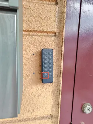 a remote control is sticking out of a door at Oasis Aoto in Tokyo