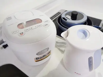 a white blender sitting on a counter next to a burner at EMILIO Nishi-Shinjuku 101,201,202 - Vacation STAY 64292v in Tokyo