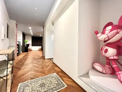 a hallway with white walls and a hallway with a marioko wall at S-asakusa -TT0418 in Tokyo