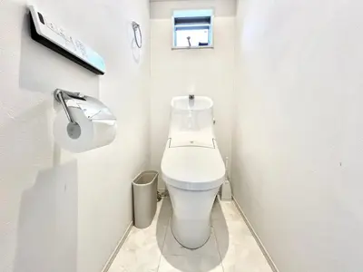 a small white bathroom with a toilet and a window at Shinjuku House-SJ0111 in Tokyo
