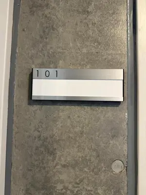 an overhead view of a sign on a concrete floor at Style Lab\u5317\u5343\u4f4f in Tokyo