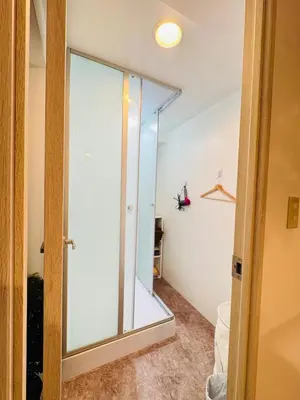 a sliding glass door in a room with at Shinjuku vista point in Tokyo