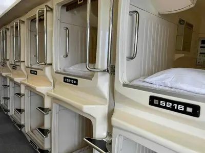an interior of an rv with a bed in it at 男性専用サウナ&カプセル Men Only Capsule Room & Sauna, Bathhouse ミナミ下北沢 Minami Shimokitazawa in Tokyo