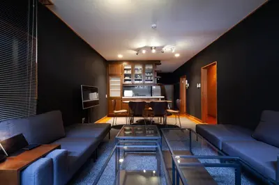 a living room with a couch and a table at lucky aoto - Vacation STAY 16176 in Tokyo