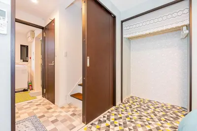 a sliding door in a room with a tile floor at Ikebukuro house with 3BR Shinjuku 5min in Tokyo