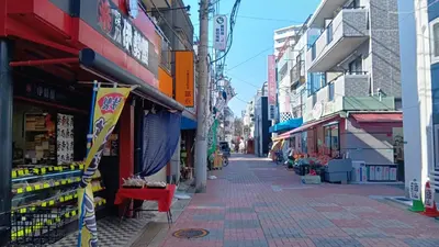 an empty street in a city with buildings at EMILIO158 - Quiet residential area near Shinjuku Free Wi-Fi in Tokyo