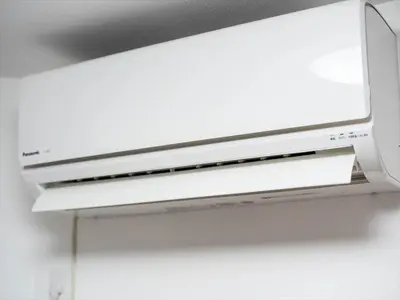 a white microwave oven hanging on a wall at Maison de Takinogawa - Vacation STAY 16164 in Tokyo